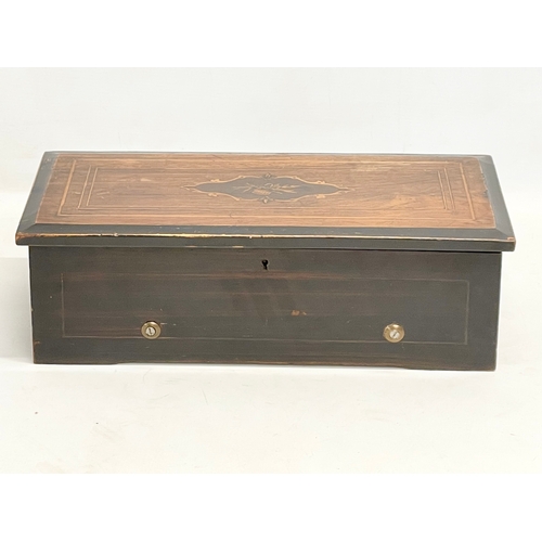 30M - A Victorian inlaid rosewood music box. 42x20x12.5cm