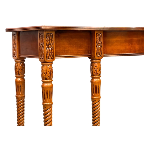 1011 - A mahogany serpentine console table with drawer. 107x40x76cm