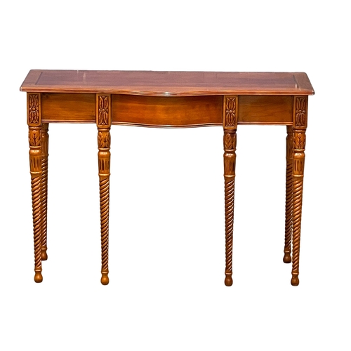 1011 - A mahogany serpentine console table with drawer. 107x40x76cm