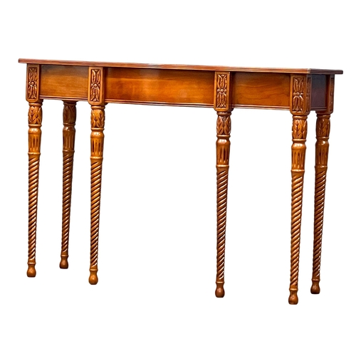 1011 - A mahogany serpentine console table with drawer. 107x40x76cm