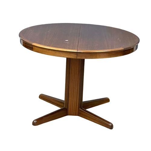 1012 - A Danish Mid Century extending dining table designed by Niels Kofoed for Kofoed Hornslet. Open 156x1... 