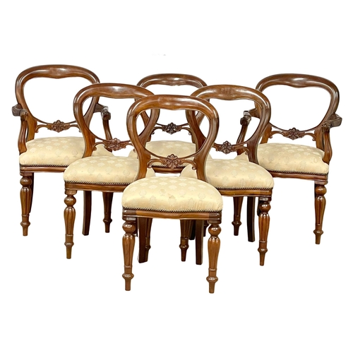 1014 - A good quality Victorian style mahogany extending dining table and 6 balloon back chairs. With winde... 