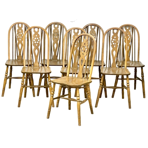 1016 - A set of 8 vintage Elm and Beech Windsor style dining chairs.