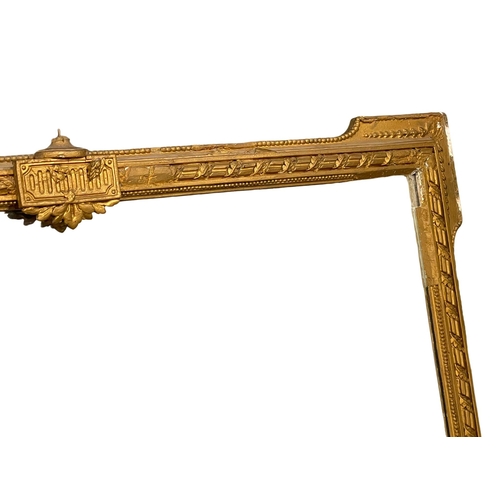 105D - A large Victorian gilt framed over mantle mirror. 127x97cm