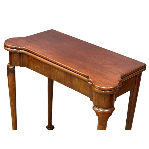 814 - A Robert Strahan of Dublin late 18th century mahogany turnover games table.  Circa 1770-1780.  83x39... 