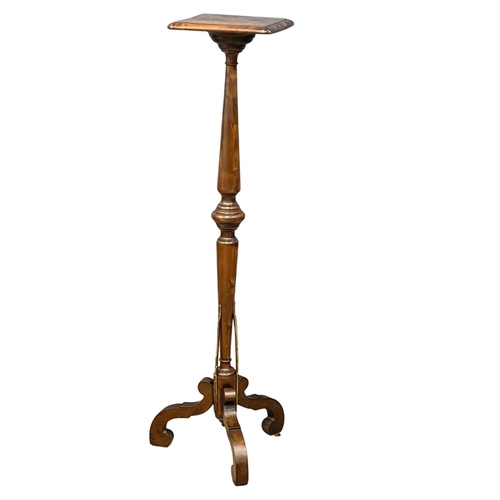 1160 - A large Victorian mahogany torchiere. 46x137.5cm