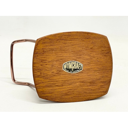 18 - A collection of Mid Century kitchenware. Teak coasters and stand, pig cocktail, double sided tray, 2... 