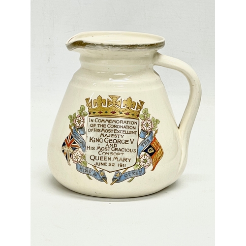 23 - A MacIntyre Burslem commemoration jug. Early Moorcroft. 1911. In Commemoration of the Coronation of ... 