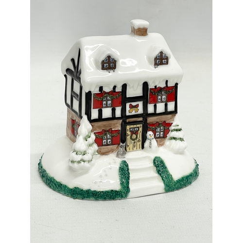 66 - A collection of Coalport pottery houses. The Farmhouse 20cm. The Master’s House 11x10.5cm. Limited E... 