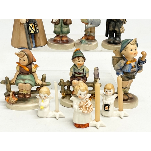 68 - A collection of 10 Goebel pottery figures.