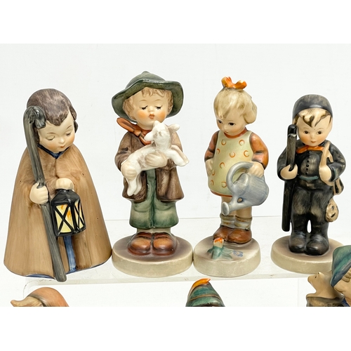 68 - A collection of 10 Goebel pottery figures.