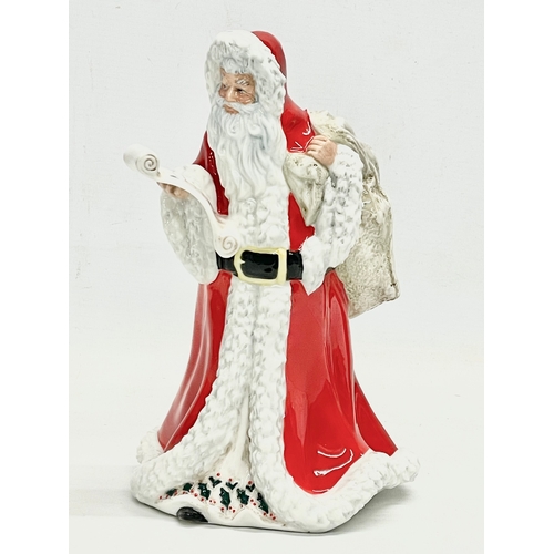 69 - A large Royal Doulton ‘Father Christmas’ figurine. HN3399. 1992. 24cm