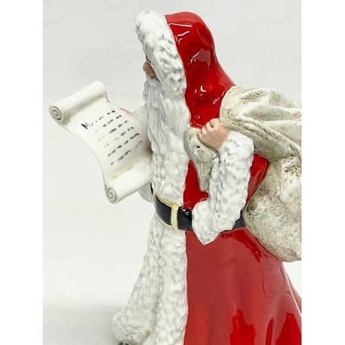 69 - A large Royal Doulton ‘Father Christmas’ figurine. HN3399. 1992. 24cm