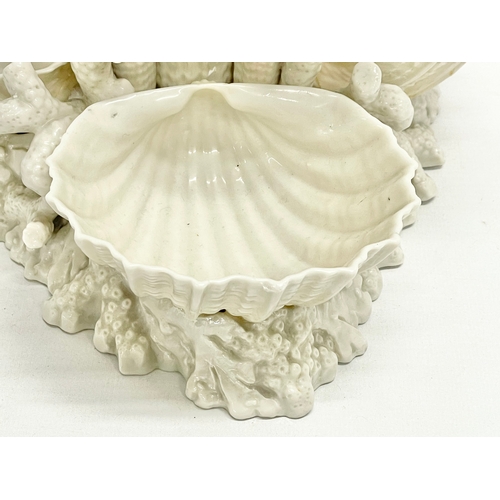 24 - A late 19th century 2nd period Belleek pottery Marine centrepiece. 22x22x28cm