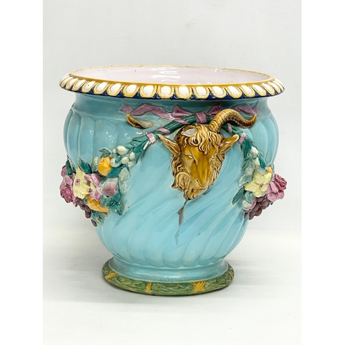 26 - A large Minton’s Majolica rams head jardiniere and platter. Late 19th century. 46x43x35cm.