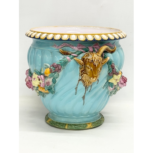 26 - A large Minton’s Majolica rams head jardiniere and platter. Late 19th century. 46x43x35cm.