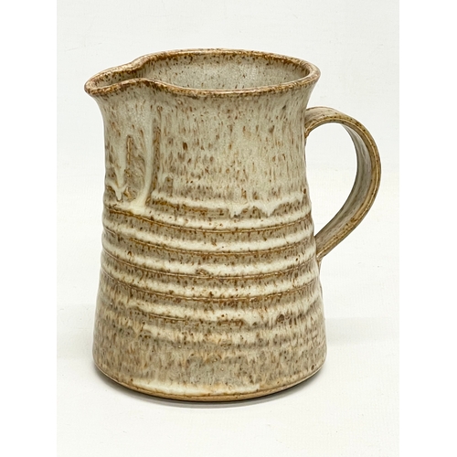 206 - A collection of vintage Studio Pottery. Jug measures 12x13cm