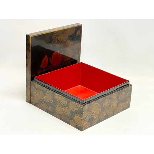 209 - A vintage Japanese lacquered box. 22.5x22.5x10.5cm