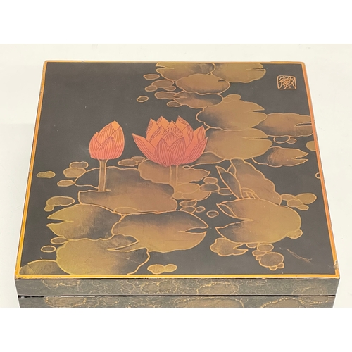 209 - A vintage Japanese lacquered box. 22.5x22.5x10.5cm