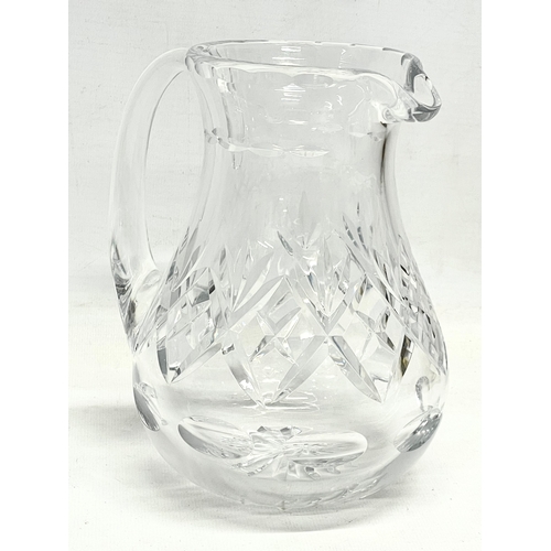 211 - 5 crystal whisky glasses and matching jug.