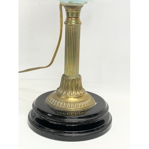 28 - A large Victorian double burner electrified oil lamp with hand painted glass bowl and brass column. ... 