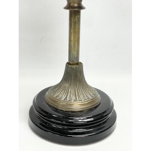 29 - A tall Victorian brass double burner oil lamp with later glass shade. 62cm