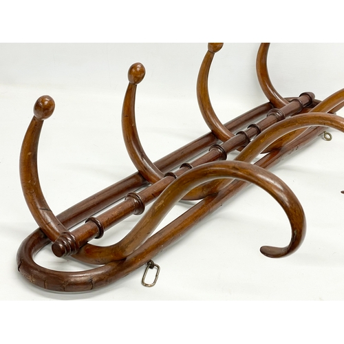 77 - An early 20th century Bentwood hat and coat rack. 73x35cm