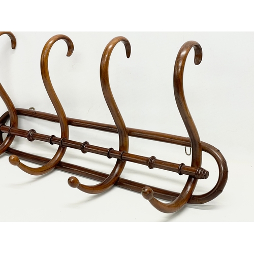 77 - An early 20th century Bentwood hat and coat rack. 73x35cm