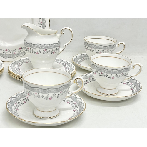 227 - A 21 piece Tuscan tea set.