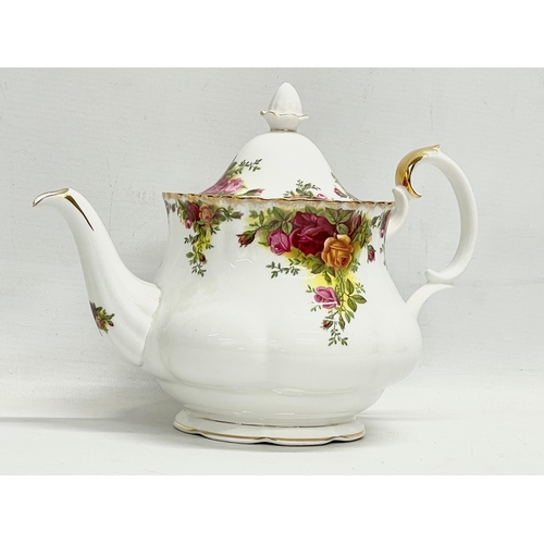 31 - A Royal Albert Old Country Roses teapot and comport cake stand. Teapot 26x19cm.