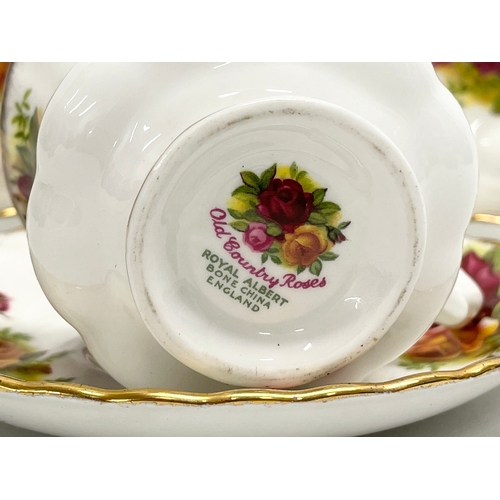 35 - A 12 piece Royal Albert ‘Old Country Roses’ coffee set.