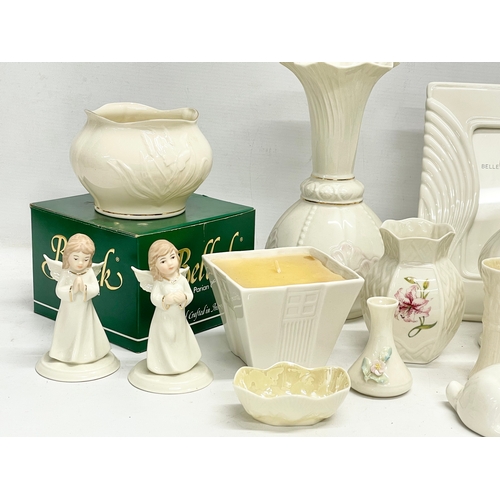 229 - A collection of Belleek pottery.