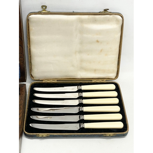 233 - A collection of vintage cutlery sets and a Wedgwood bar set in box. A silver plated cutlery set in o... 