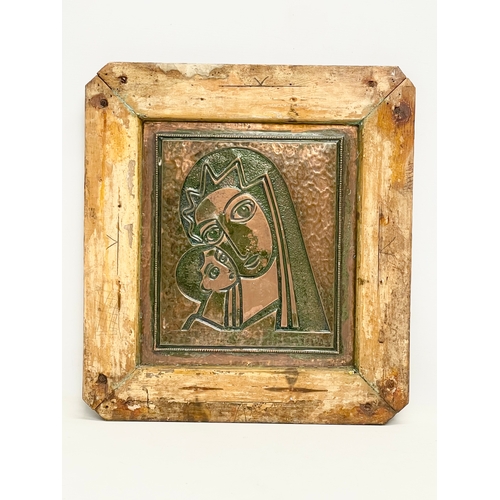 81 - An early 20th century Madonna and Child copper panel on wooden frame. 45x49cm