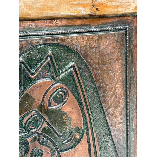 81 - An early 20th century Madonna and Child copper panel on wooden frame. 45x49cm