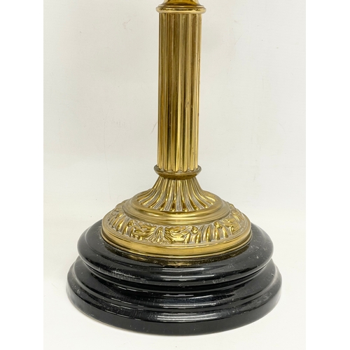 83 - A large Victorian style brass double burner oil lamp. 69cm