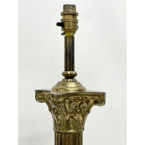 86 - A large vintage Corinthian style brass table lamp. 64.5cm