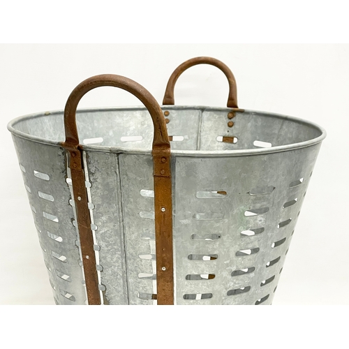 91 - A vintage French galvanised olive basket. 45x40x45cm