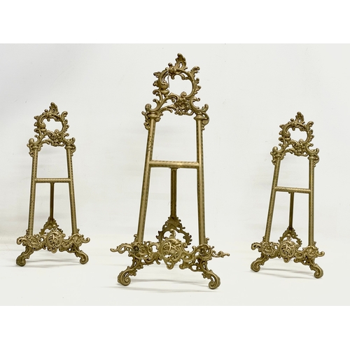 92 - 3 large 18th century style brass tabletop easels. Largest 27x55cm.