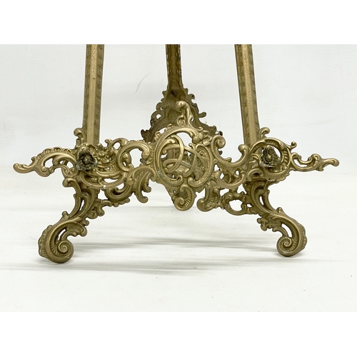 92 - 3 large 18th century style brass tabletop easels. Largest 27x55cm.