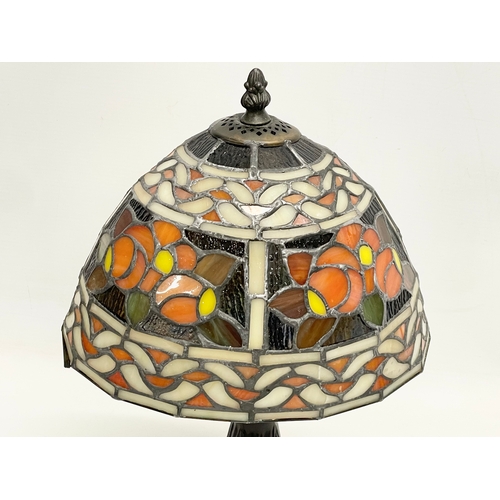 241 - A Tiffany style table lamp. 37cm