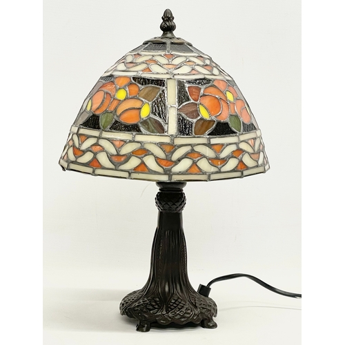 241 - A Tiffany style table lamp. 37cm