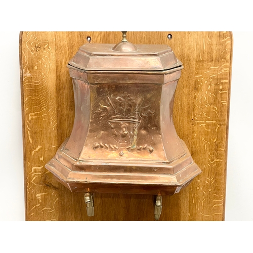 95 - A large 19th century French copper water fountain on oak frame. 54x40x103cm