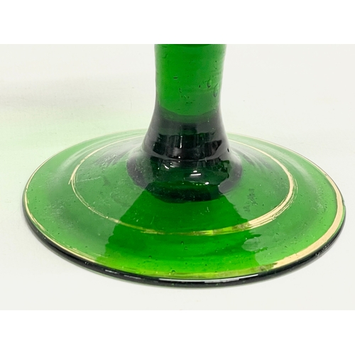 244 - A late 19th century hand blown Bristol Green vase in the manner of Moser. 14x11x13.5cm