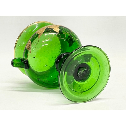 244 - A late 19th century hand blown Bristol Green vase in the manner of Moser. 14x11x13.5cm