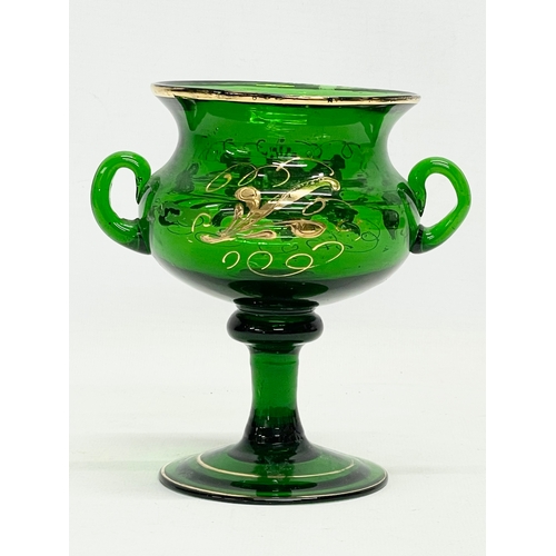 244 - A late 19th century hand blown Bristol Green vase in the manner of Moser. 14x11x13.5cm