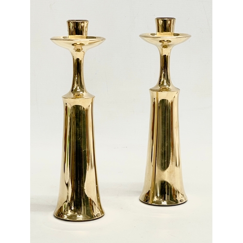 39 - A pair of Danish Mid Century brass candlesticks designed by Jens Harald Quistgaard for Dansk Design.... 