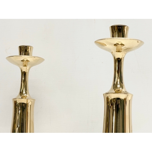 39 - A pair of Danish Mid Century brass candlesticks designed by Jens Harald Quistgaard for Dansk Design.... 