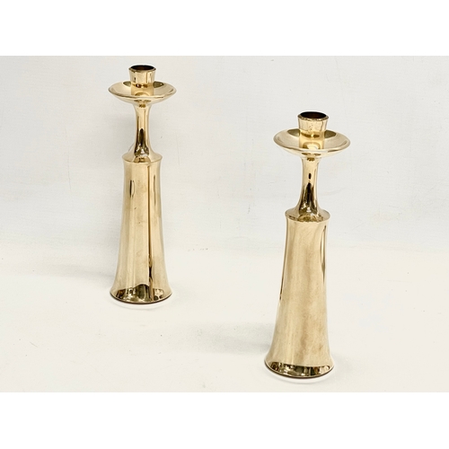 39 - A pair of Danish Mid Century brass candlesticks designed by Jens Harald Quistgaard for Dansk Design.... 