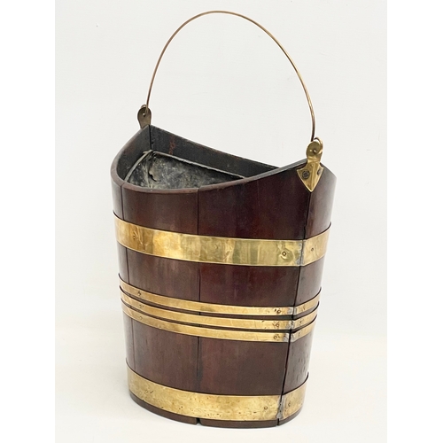 40 - A George III brass bound mahogany peat bucket with original liner. Circa 1800. 37x27x37cm